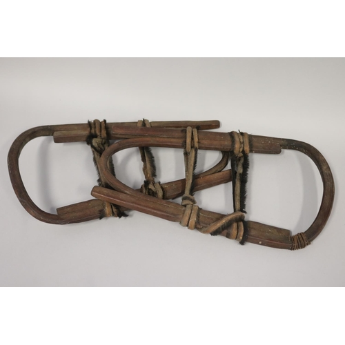 Pair of old wooden snow shoes,