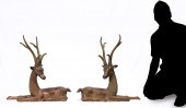 PAIR OF OPPOSING BRASS RECUMBE