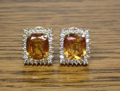 PAIR OF ORANGE SAPPHIRE AND DI