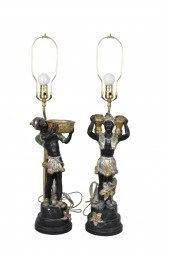 PAIR OF PAINTED PLASTER BLACKA