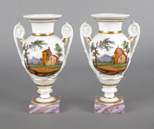 Pair of Paris porcelain urns ca.