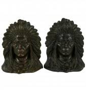 PAIR OF PATINATED BRONZE BOOKE