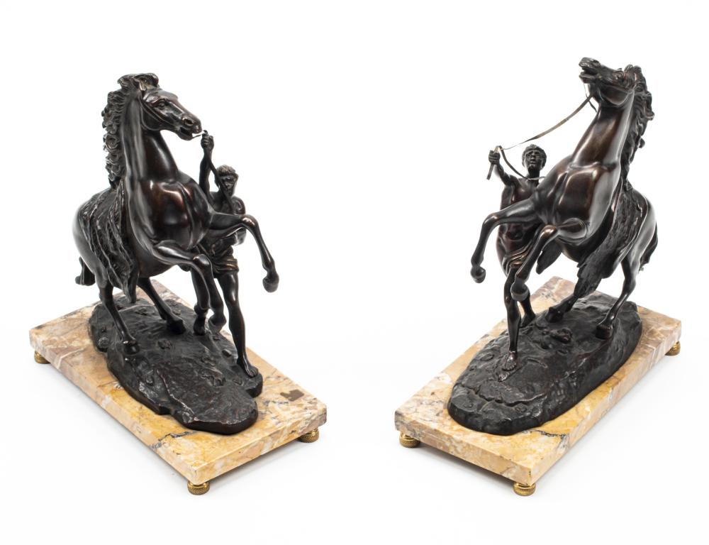 PAIR OF PATINATED BRONZE "MARLY