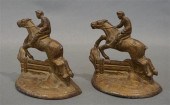 PAIR OF PATINATED IRON 'JUMPER