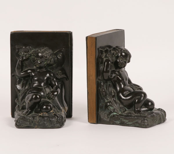 Pair of patinated metal bookends;