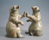 PAIR OF PATINATED METAL POLAR