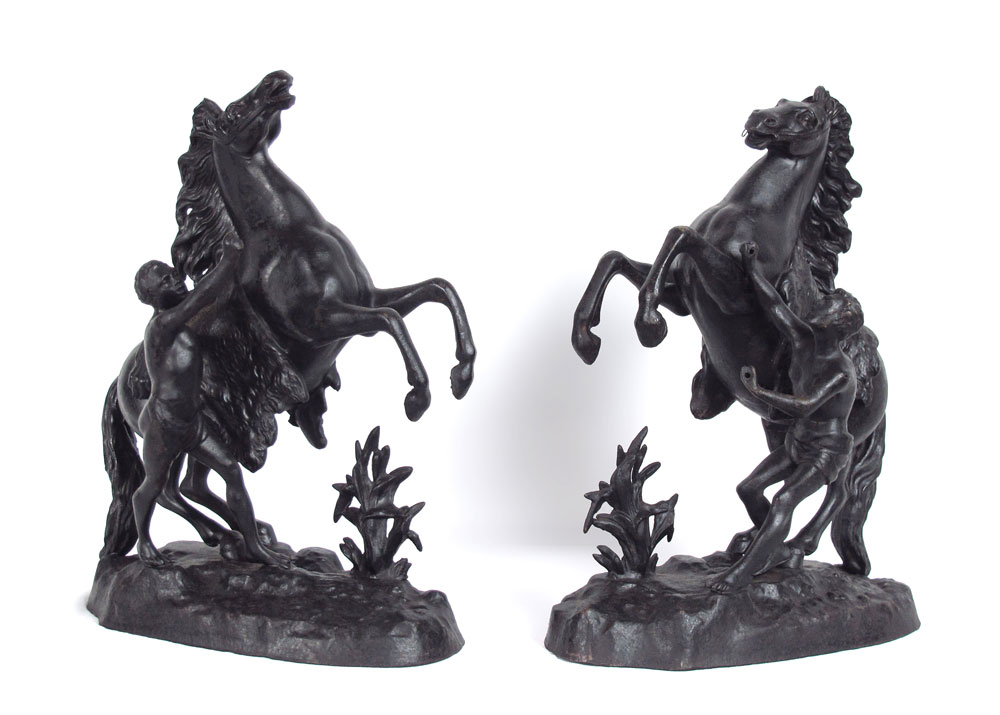 PAIR OF PATINATED SCULPTURES