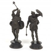PAIR OF PATINATED SPELTER WARR