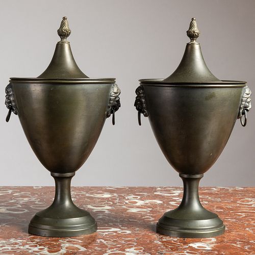 PAIR OF PATINATED TôLE URNS AND