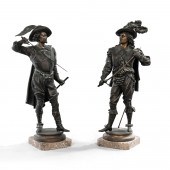 PAIR OF PATINATED WHITE METAL