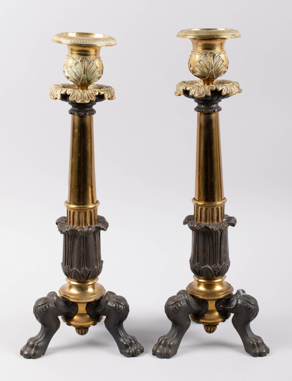 PAIR OF PAWFOOT CANDLESTICKS