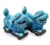 PAIR OF PEACOCK GLAZED FOO LIO