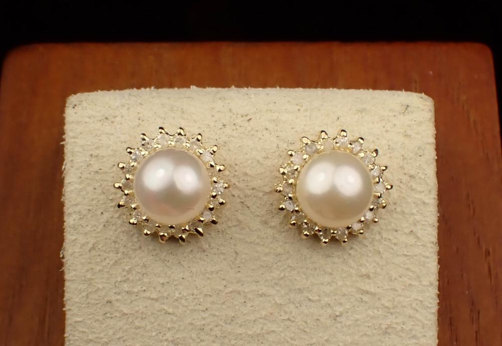 PAIR OF PEARL AND DIAMOND HALO