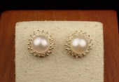 PAIR OF PEARL AND DIAMOND HALO