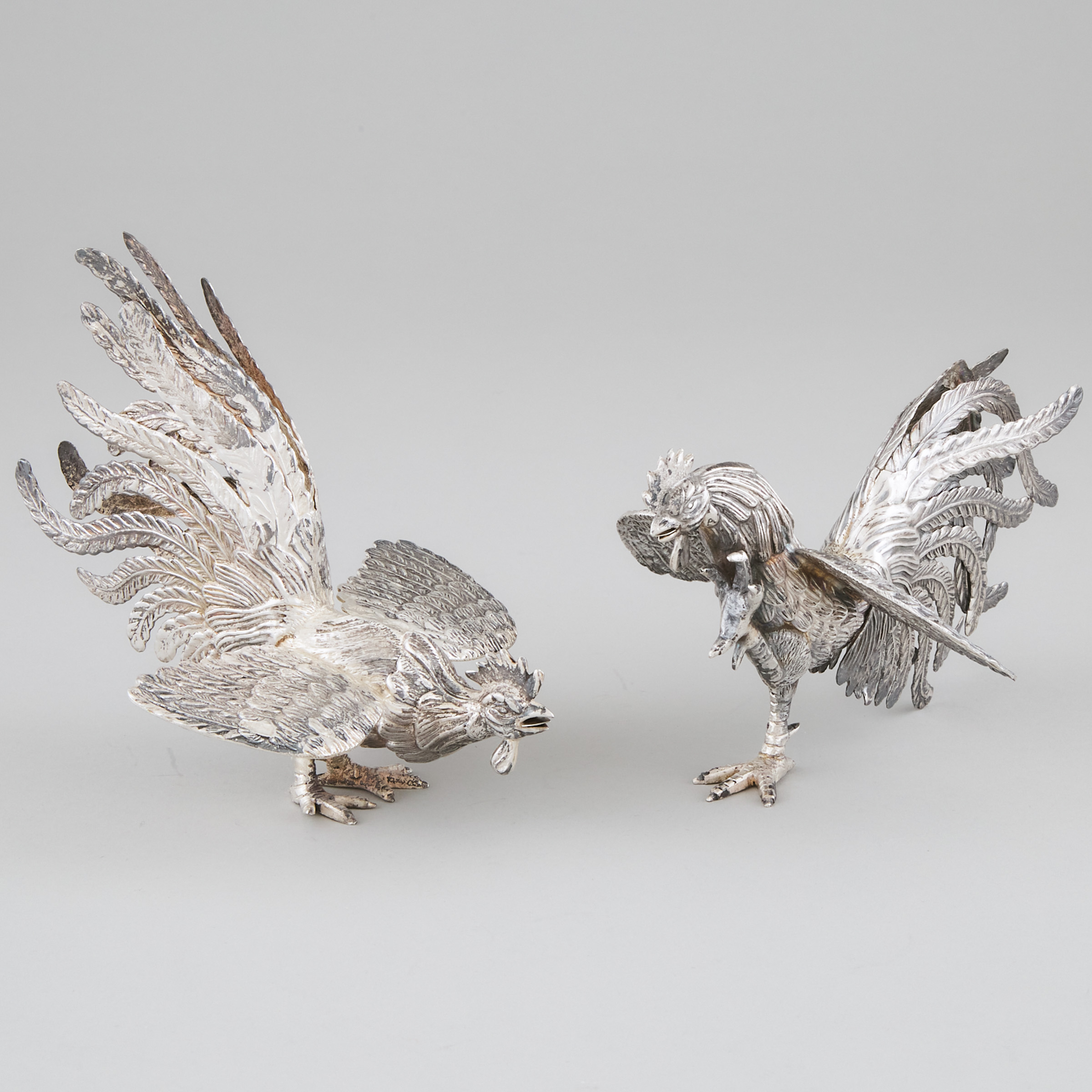 Pair of Peruvian Silver Fighting
