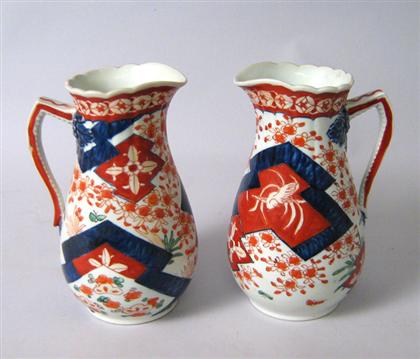 Pair of pitchers    Decorated