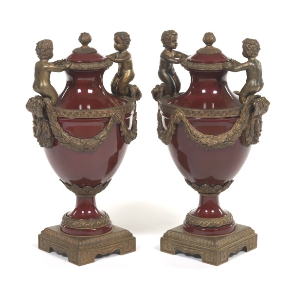 PAIR OF PORCELAIN AND BRONZE URNS