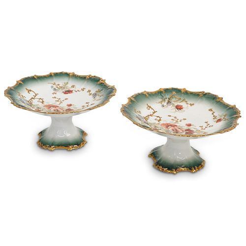 PAIR OF PORCELAIN PEDESTAL