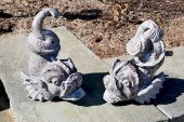 PAIR OF POURED AND MOLDED SEA