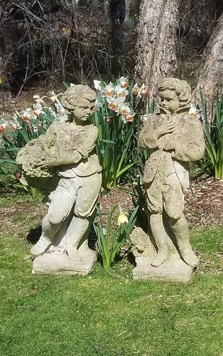 PAIR OF POURED CEMENT FIGURESPair