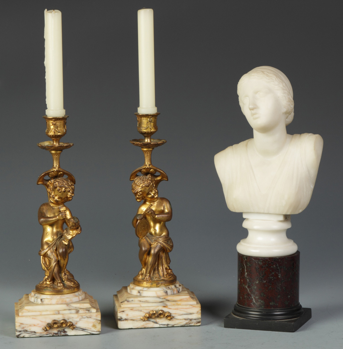 Pair of Putti Candelabras &