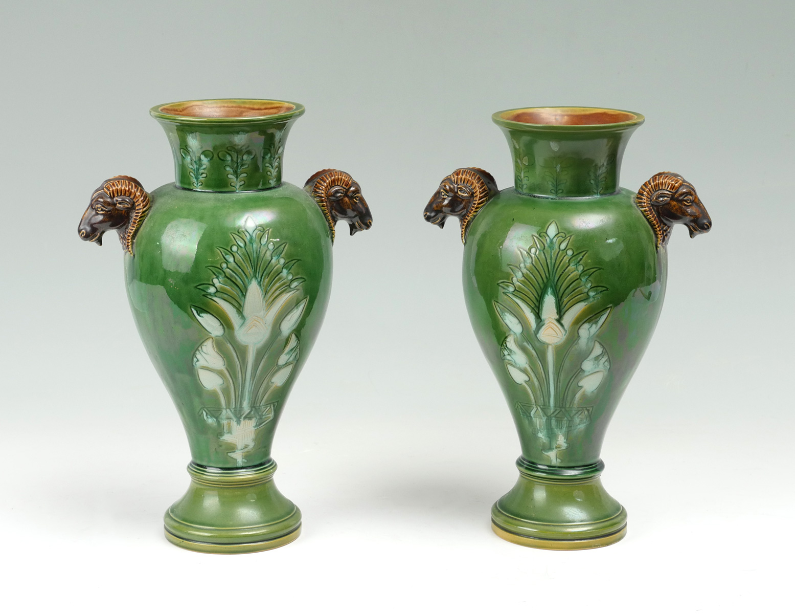 PAIR OF RAMS HEAD MAJOLICA VASES: 2