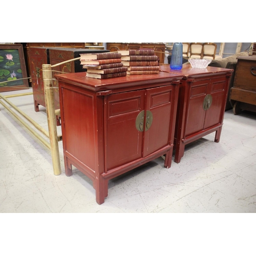Pair of red lacquer cabinets,