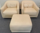 PAIR OF ROCHE BOBOIS TAN LEATH