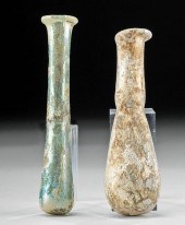 PAIR OF ROMAN GLASS UNGUENTARI