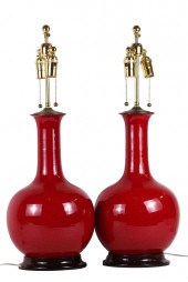 PAIR OF SANG DE BOEUF PORCELAI