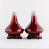PAIR OF SANG DE BOEUF PORCELAI
