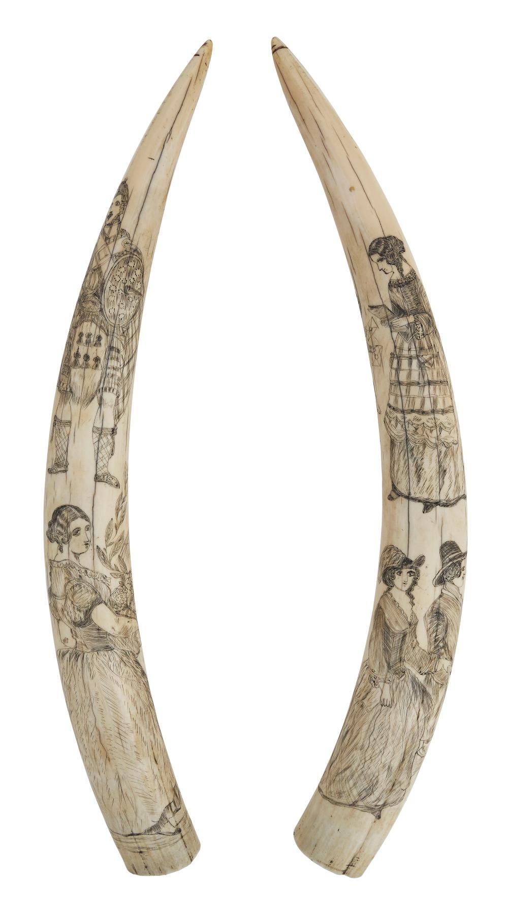 PAIR OF SCRIMSHAW WALRUS TUSKS WITH