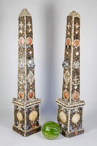 PAIR OF SEASHELL ENCRUSTED CONCRETE