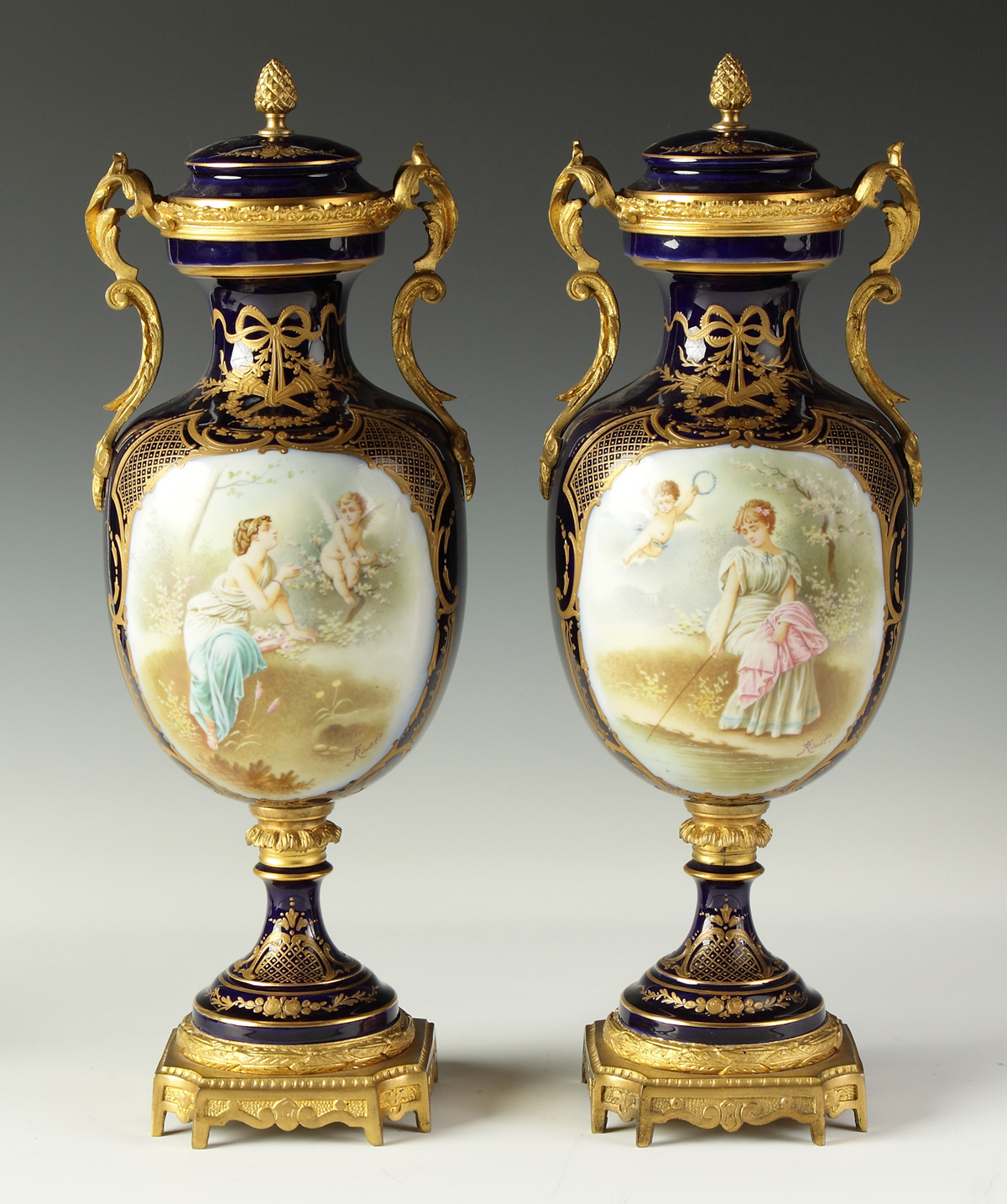 Pair of Sevres Covered Urns