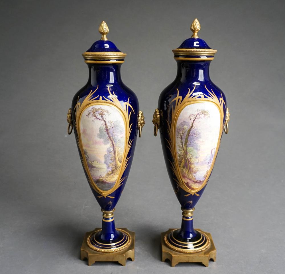 PAIR OF SEVRES TYPE PORCELAIN URNS,
