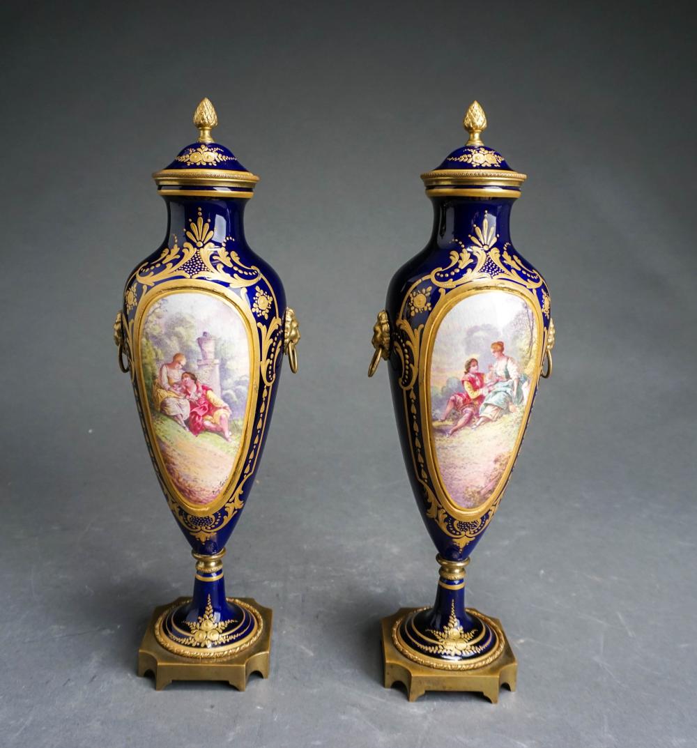 PAIR OF SEVRES TYPE PORCELAIN URNS,