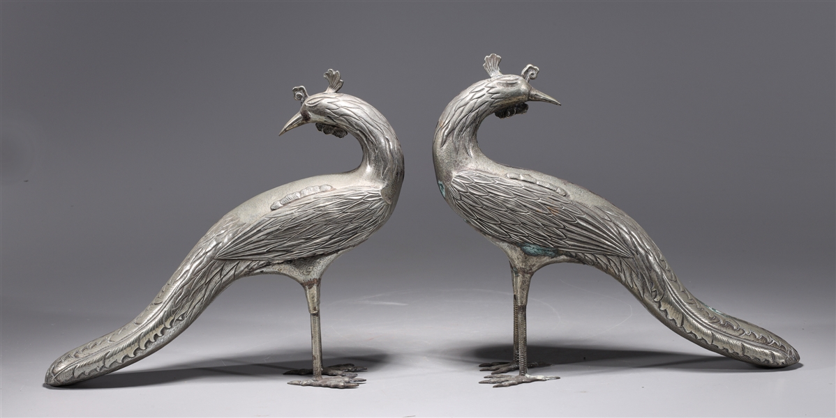 Pair of silver metal peacock