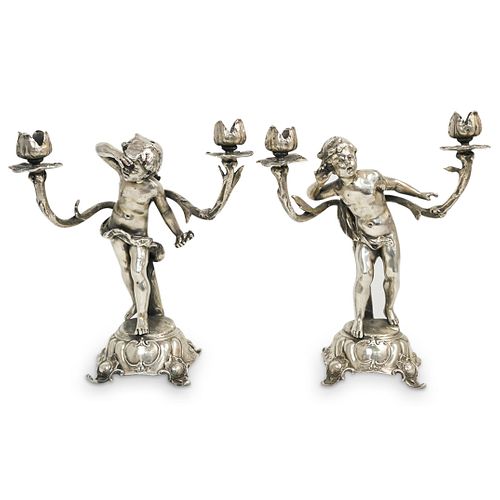 PAIR OF SILVER PLATED FIGURAL TORCH