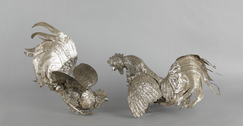 Pair of silvered fighting cockerels