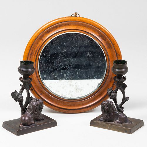 PAIR OF SMALL BRONZE LION FORM