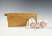 PAIR OF SMALL CHINESE IRON RED