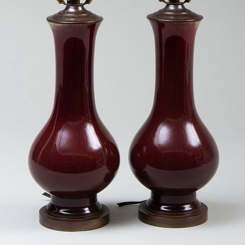 PAIR OF SMALL COPPER RED GLAZED
