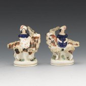 PAIR OF STAFFORDSHIRE GIRL RID