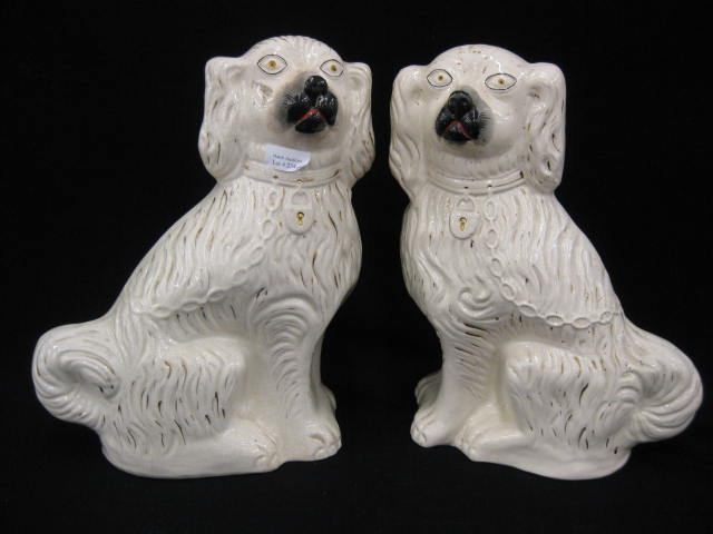 Pair of Staffordshire Pottery Dog