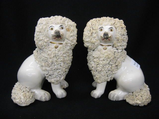 Pair of Staffordshire Pottery Dog