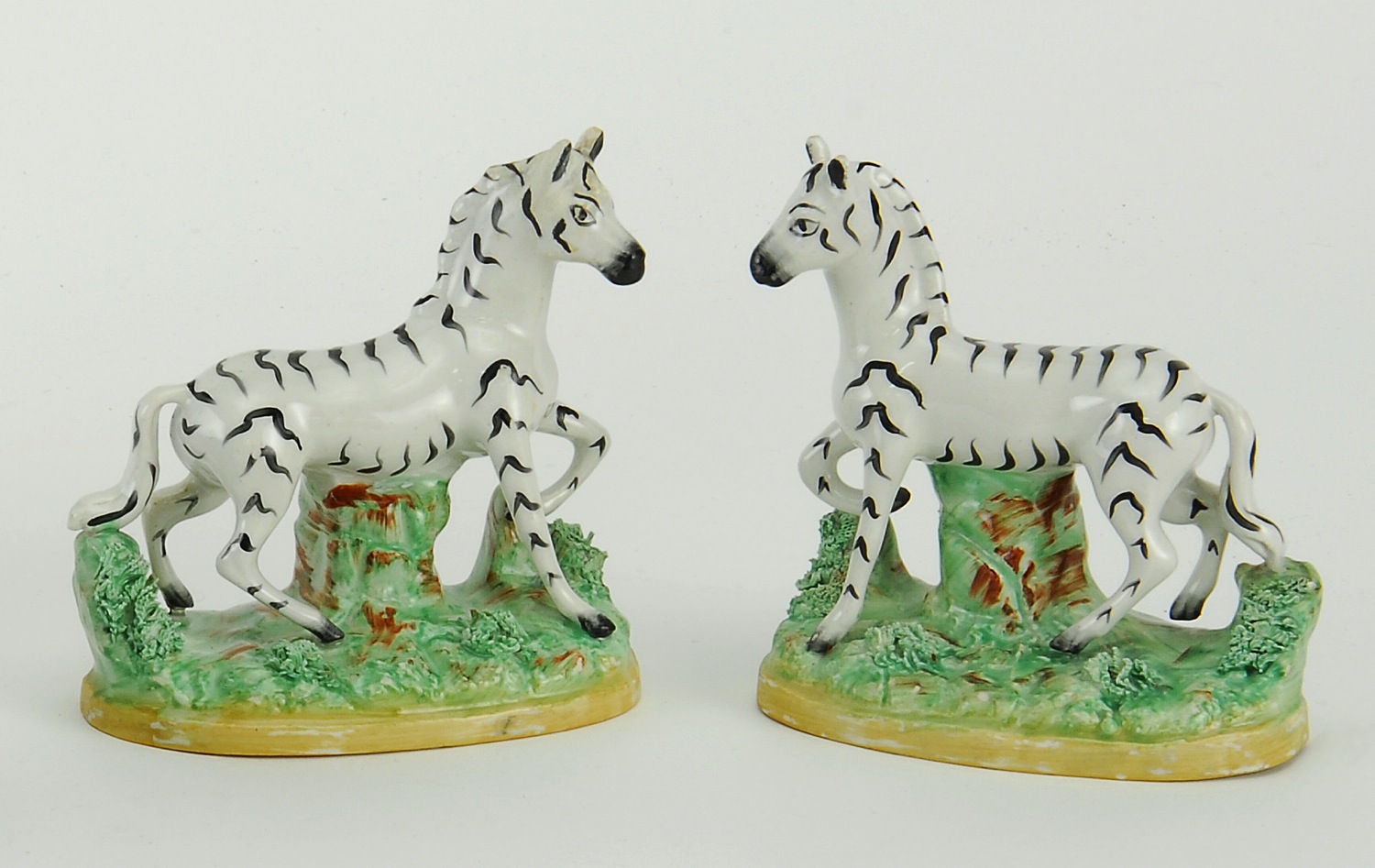 PAIR OF STAFFORDSHIRE PRANCING