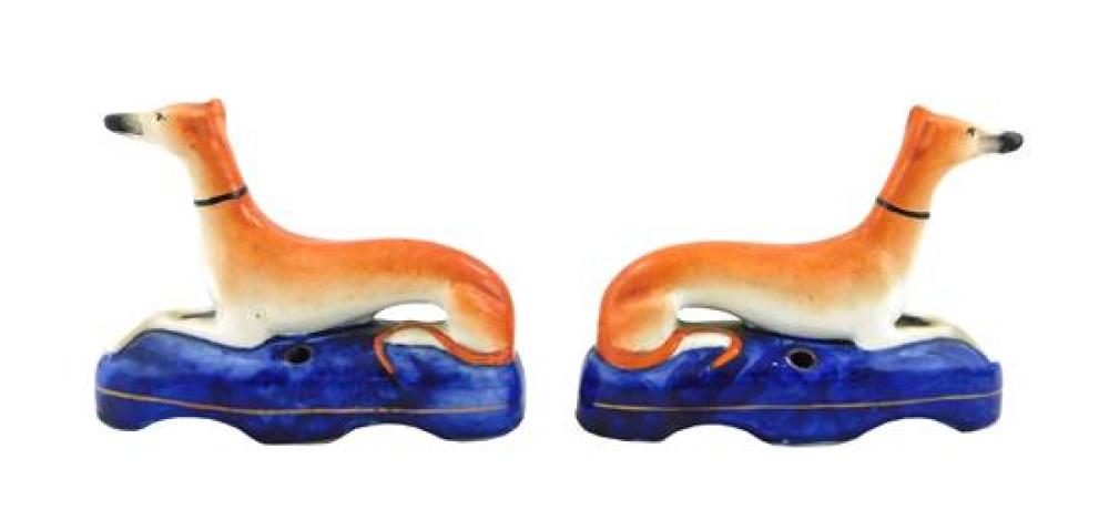 PAIR OF STAFFORDSHIRE RECLINING