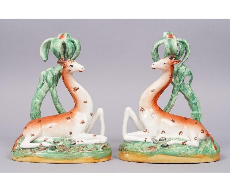 Pair of Staffordshire recumbent