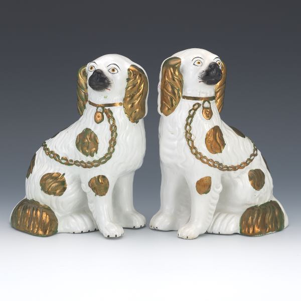PAIR OF STAFFORDSHIRE SPANIELS WITH