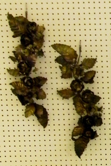 Pair of stamped metal floral